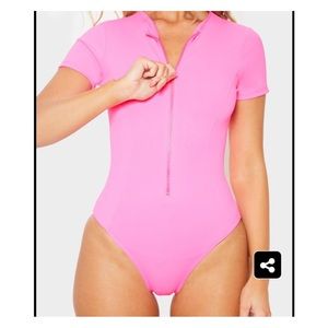pink zip up swimsuit
